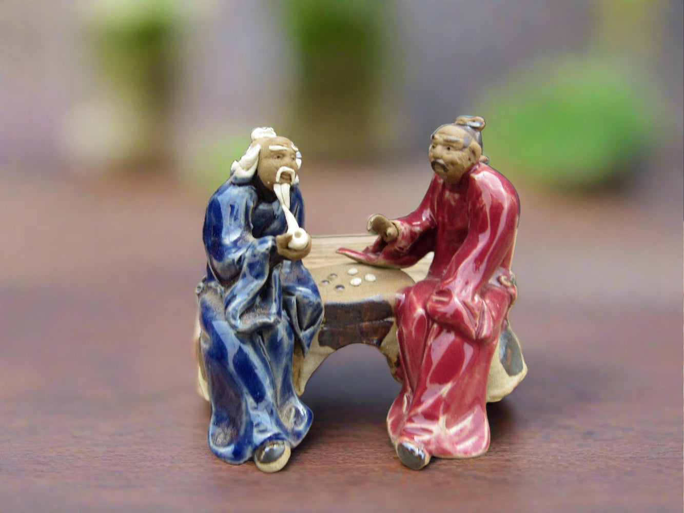 Men Playing Go Figurine